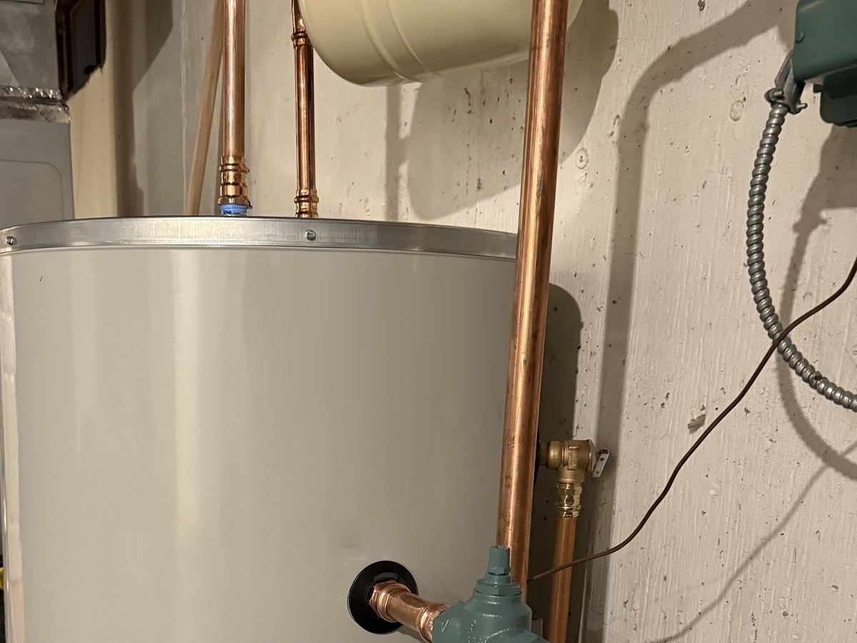 Code-compliant residential tank water heater replacement